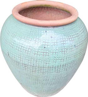 Unique Turquoise Glazed Terracotta Pot: Unique Turquoise Glazed Terracotta Pot This unique turquoise terracotta pot showcases a stunning textured surface complemented by a light green glaze, making it a beautiful addition to any vintage kit