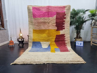 Handmade Moroccan Berber Wool Rug 10 x 5 Feet: Handmade Moroccan Berber Wool Rug 10 x 5 Feet Discover the beauty of this elegant and colorful handmade Moroccan Berber wool rug. Meticulously crafted by skilled local Berber women weavers in the