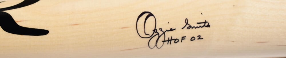 Ozzie Smith Signed Blonde Rawlings Baseball Bat HOF Fanatics Authenticated: Ozzie Smith Signed Blonde Rawlings Baseball Bat HOF Fanatics Authenticated This original autographed baseball bat features the legendary Ozzie Smith, known for his exceptional skills as a shortstop wi