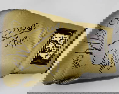 Signed Boxing Glove by Gilberto Zurdo John Ramirez BAS Authentication: Signed Boxing Glove by Gilberto Zurdo John Ramirez BAS Authentication This is an original boxing glove signed by Gilberto Zurdo and John Ramirez, featuring the autographs of notable boxers Gilberto