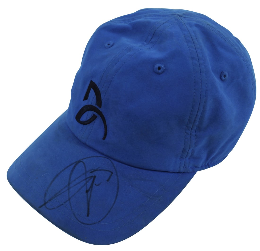 Novak Djokovic Signed Blue Lacoste Match Used Hat with Beckett COA: Novak Djokovic Signed Blue Lacoste Match Used Hat with Beckett COA Own a piece of tennis history with this authentic signed blue Lacoste match used hat by Novak Djokovic. This hat has been personally