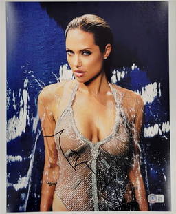 Angelina Jolie Autographed 11x14 Photo Mr. & Mrs. Smith Beckett Authenticated: Angelina Jolie Autographed 11x14 Photo Mr. & Mrs. Smith Beckett Authenticated This stunning 11x14 photograph captures the allure of actress Angelina Jolie, famously known for her role in "Mr. & Mrs.