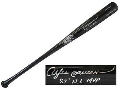 Andre Dawson Signed Louisville Slugger Bat with 87 NL MVP Inscription: Andre Dawson Signed Louisville Slugger Bat with 87 NL MVP Inscription This is an original signed Louisville Slugger black baseball bat by Andre Dawson, featuring the inscription '87 NL MVP'.