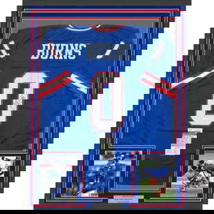 Framed Autographed Brian Burns New York Giants Jersey JSA COA 35x39: Framed Autographed Brian Burns New York Giants Jersey JSA COA 35x39 This framed autographed jersey features Brian Burns, showcasing his signature on a vibrant New York Giants retro blue jersey.