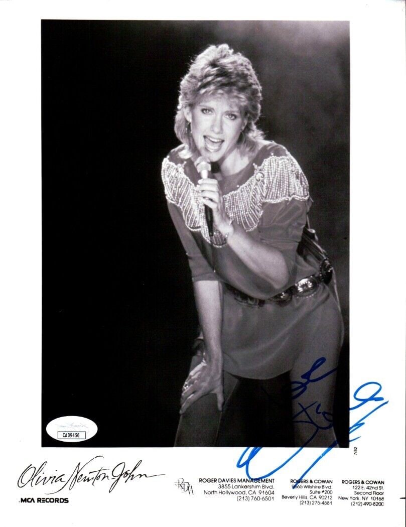 Olivia Newton John Autographed 8X10 Photo JSA Authenticated: Olivia Newton John Autographed 8X10 Photo JSA Authenticated This is an original 8X10 photograph of Olivia Newton John, the iconic singer and actress known for her role in 'Grease.' The photograph is a