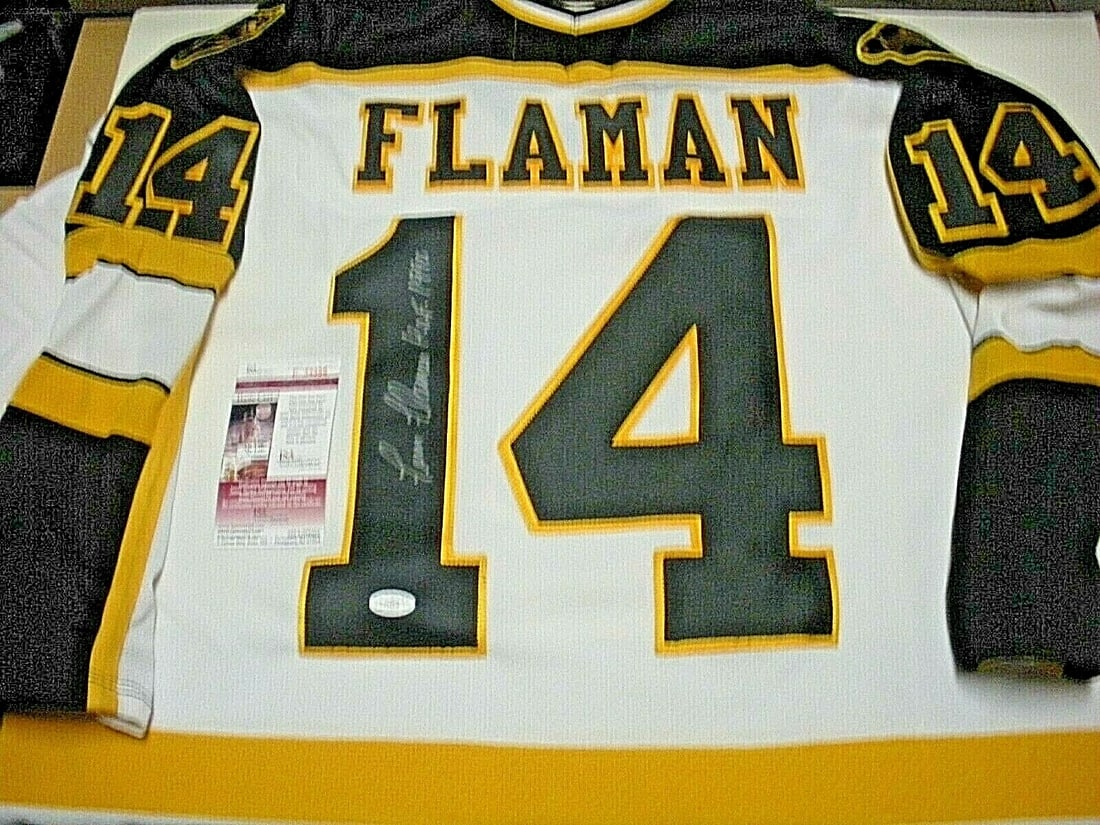 Fern Flaman Signed Boston Bruins CCM Jersey 1990 HOF JSA COA: Fern Flaman Signed Boston Bruins CCM Jersey 1990 HOF JSA COA This official licensed CCM jersey, signed by Hall of Famer Fern Flaman, is a must-have for any Boston Bruins fan. This original piece showc
