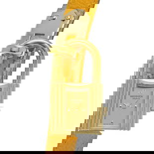 HERMES Kelly Watch KE1.201 Ladies Quartz Yellow Gold Plated 20mm: HERMES Kelly Watch KE1.201 Ladies Quartz Yellow Gold Plated 20mm Introducing the HERMES Kelly Watch KE1.201, a sophisticated wristwatch designed for ladies. This exquisite timepiece features a