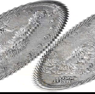 1877-S Trade Silver Dollar XF San Francisco Mint Coin: 1877-S Trade Silver Dollar XF San Francisco Mint Coin This 1877-S Trade Silver Dollar is a remarkable piece of history, showcasing the artistic design of William Barber. This coin is from the San