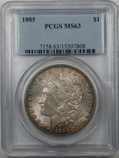 1885 Morgan Silver Dollar Coin PCGS MS 63 Uncirculated: 1885 Morgan Silver Dollar Coin PCGS MS 63 Uncirculated This 1885 Morgan Silver Dollar Coin is a remarkable piece of numismatic history, certified by PCGS with a grade of MS 63. Struck in 1885 at the
