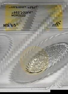 1953 Morocco 20 Francs Coin ANACS MS 65 Uncirculated Silver: 1953 Morocco 20 Francs Coin ANACS MS 65 Uncirculated Silver This 1953 Morocco 20 Francs coin is a remarkable collectible, certified by ANACS with a grade of MS 65, indicating its uncirculated