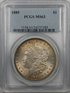 1885 Morgan Silver Dollar Coin PCGS MS 63 Toned Silver: 1885 Morgan Silver Dollar Coin PCGS MS 63 Toned Silver This 1885 Morgan Silver Dollar Coin is a remarkable collectible with a denomination of $1, certified by PCGS and graded MS 63. Struck in
