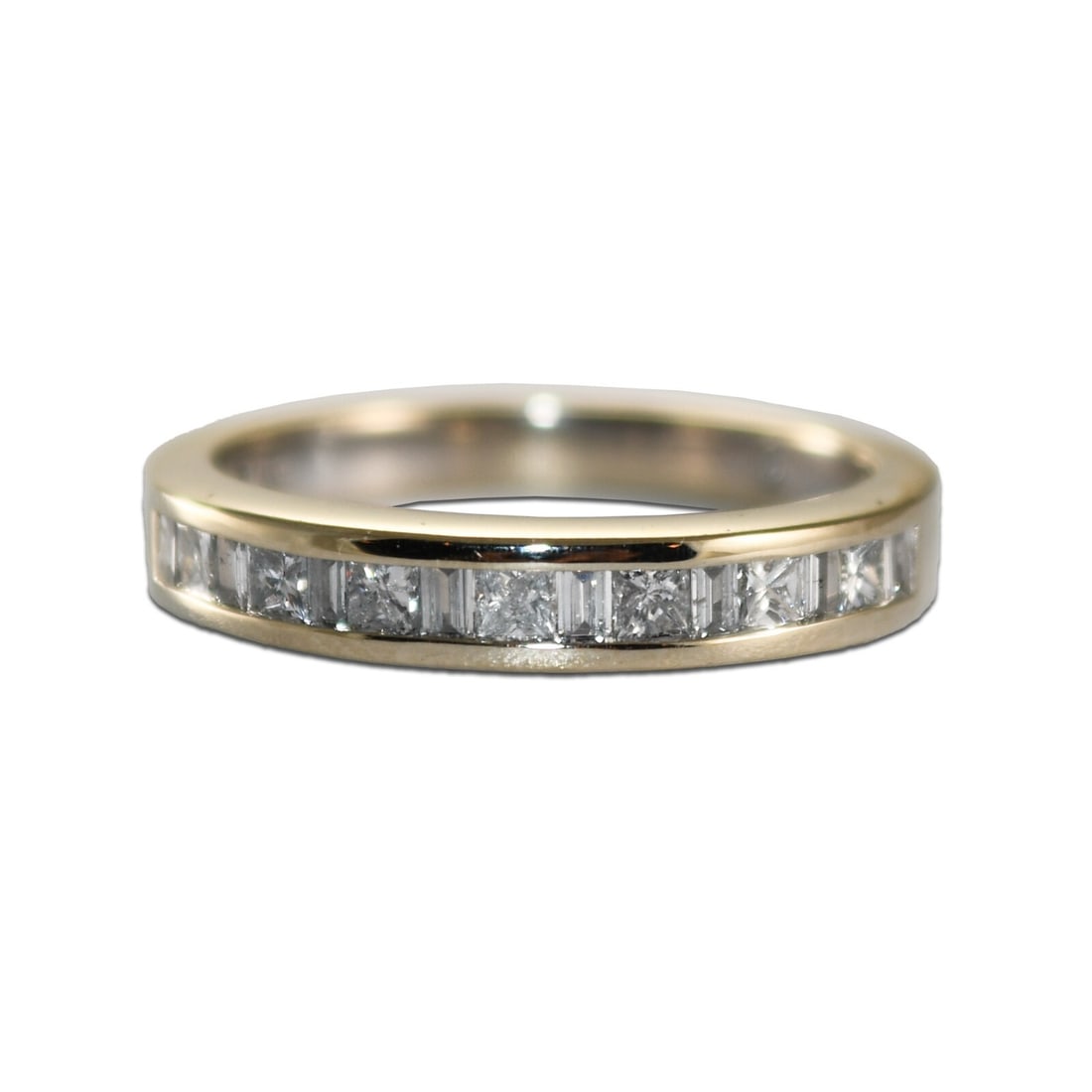 14K White Gold Diamond Band Ring 0.50ct G-H SI Quality: 14K White Gold Diamond Band Ring 0.50ct G-H SI Quality This stunning 14K white gold diamond band ring features a total carat weight of 0.50 ct, showcasing exquisite round brilliant and baguette-cut di