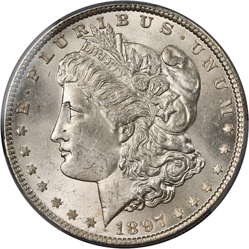 1897-P Morgan Silver Dollar PCGS MS63 Brilliant White Coin: 1897-P Morgan Silver Dollar PCGS MS63 Brilliant White Coin This 1897-P Morgan Silver Dollar is a stunning example of American coinage, featuring a brilliant white finish and excellent eye appeal. Grad