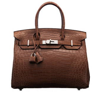 Hermes Birkin 30cm Matte Marron d'Inde Crocodile Bag Palladium Hardware: Hermes Birkin 30cm Matte Marron d'Inde Crocodile Bag Palladium Hardware Introducing the Hermes 30cm Matte Marron d'Inde Niloticus Crocodile Birkin Bag, a hallmark of luxury and sophistication. This