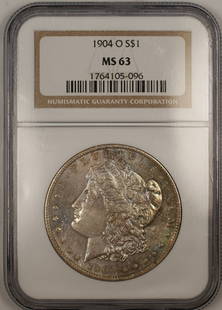 1904-O Morgan Silver Dollar NGC MS63 Uncirculated Silver Coin: 1904-O Morgan Silver Dollar NGC MS63 Uncirculated Silver Coin This 1904-O Morgan Silver Dollar features a stunning design and is graded MS-63 by NGC, indicating it is uncirculated with a semi