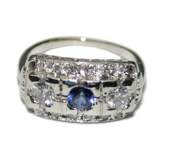 Stunning 14K White Gold Art Deco Sapphire Diamond Ring 5.75: Stunning 14K White Gold Art Deco Sapphire Diamond Ring 5.75 This exquisite 14K white gold Art Deco ring showcases a stunning three-stone design featuring a vibrant 0.23ct round blue sapphire at its