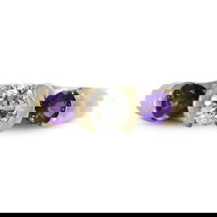 14K White Gold .50ct Diamond Amethyst Ring Size 7: 14K White Gold .50ct Diamond Amethyst Ring Size 7 This exquisite 14K white gold ring features a stunning .50 carat round brilliant cut diamond at its center, showcasing a G to H color and I1