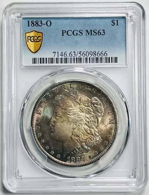 1883 O Morgan Silver Dollar PCGS MS63 Beautiful Toning Uncirculated: 1883 O Morgan Silver Dollar PCGS MS63 Beautiful Toning Uncirculated This stunning 1883 O Morgan Silver Dollar is certified by PCGS with a grade of MS-63, showcasing beautiful toning. Struck in silver 