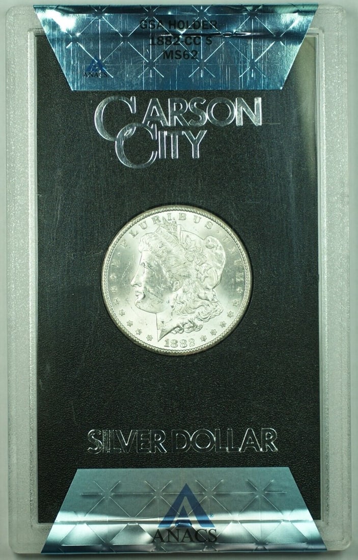 1882-CC GSA Morgan Silver Dollar ANACS MS-62 with Box and COA: 1882-CC GSA Morgan Silver Dollar ANACS MS-62 with Box and COA This 1882-CC GSA Morgan Silver Dollar is a stunning piece of numismatic history. Struck in 1882 at the Carson City mint, this coin boasts 