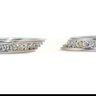 18K White Gold .50ct Diamond Wedding Band Size 4.75 Sizable: 18K White Gold .50ct Diamond Wedding Band Size 4.75 Sizable This elegant 18K White Gold Diamond Band features a total diamond weight of .50ct, showcasing round brilliant cut diamonds that encircle