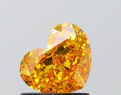 Loose Diamond - HEART 1.01ct Fancy Vivid Yellow VS1: Loose Diamond - HEART 1.01ct Fancy Vivid Yellow VS1 Source: This is a real non-mined Diamond that has been grown in a lab Shape: HEART Carats: 1.01 Color: Fancy Vivid Yellow Certification: IGI