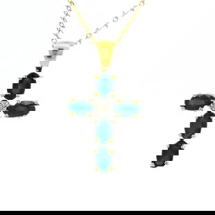 14k Gold 1.5ctw Oval Blue Sapphire Diamond Cross Pendant Necklace: 14k Gold 1.5ctw Oval Blue Sapphire Diamond Cross Pendant Necklace This exquisite necklace features a stunning cross pendant adorned with an oval blue sapphire and shimmering diamonds. Crafted from 14k