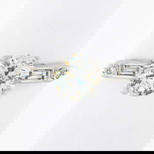 Vintage Platinum 1.33ctw Round Diamond Solitaire Engagement Ring: Vintage Platinum 1.33ctw Round Diamond Solitaire Engagement Ring This exquisite vintage engagement ring showcases a stunning 1.33ctw of diamonds set in luxurious platinum. The ring features a prong
