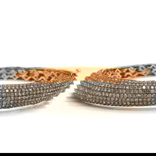 Elegant 18K Rose Gold Bangle with 10 Ct Champagne Diamonds: Elegant 18K Rose Gold Bangle with 10 Ct Champagne Diamonds This exquisite 18K Rose Gold Champagne Diamond Bangle is a stunning addition to any jewelry collection. It features approximately 10.00 ct of