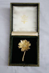 18K Yellow Gold Diamond Sunflower Brooch by Marlene Stove: 18K Yellow Gold Diamond Sunflower Brooch by Marlene Stove This exquisite 18K yellow gold brooch showcases a stunning sunflower design, adorned with five sparkling diamonds featuring G color and VS