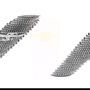 Chanel Black Crystal Lipstick Case on Chain Italy: Chanel Black Crystal Lipstick Case on Chain Italy This Lipstick Case on Chain features a resin body with crystal embellishments, a leather woven chain link strap, and a top flap with a push lock