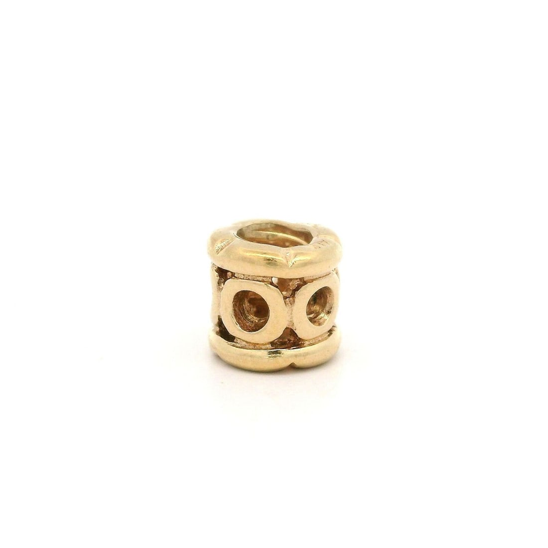 Pandora 14k Yellow Gold Open Work Circles Charm: Pandora 14k Yellow Gold Open Work Circles Charm This exquisite Pandora charm features an open work design with circles and a decorative border, crafted from 14k yellow gold. The charm is a perfect add