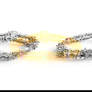 Vintage 14k Yellow Gold Bracelet with Tanzanite Pink Green Tourmaline: Vintage 14k Yellow Gold Bracelet with Tanzanite Pink Green Tourmaline This exquisite vintage bracelet showcases a stunning design crafted from 14k yellow gold with a luxurious satin finish. It feature