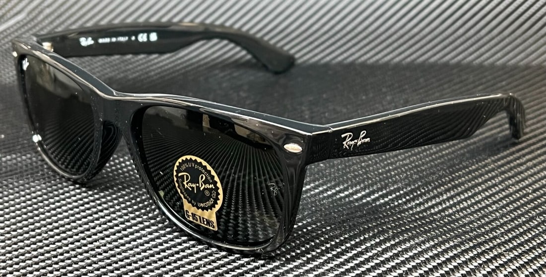 Ray Ban RB2132 901 Black Square 52mm Unisex Sunglasses: Ray Ban RB2132 901 Black Square 52mm Unisex Sunglasses Discover the stylish RAY BAN RB2132 901 sunglasses, featuring a sleek black square frame. These unisex sunglasses are designed to provide a conte