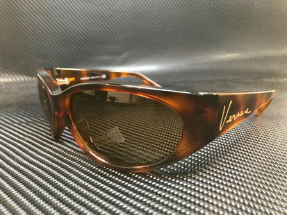 Versace VE4386 62mm Beige Round Women's Sunglasses: Versace VE4386 62mm Beige Round Women's Sunglasses Elevate your style with these Versace VE4386 sunglasses, featuring a chic round design that perfectly complements any outfit. The frame boasts a soph