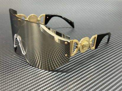 Versace VE2258 Silver Frame Grey Mirror Unisex Sunglasses 71mm: Versace VE2258 Silver Frame Grey Mirror Unisex Sunglasses 71mm Elevate your style with these VERSACE VE2258 sunglasses, featuring a sleek silver frame complemented by a striking grey mirror lens. Desi