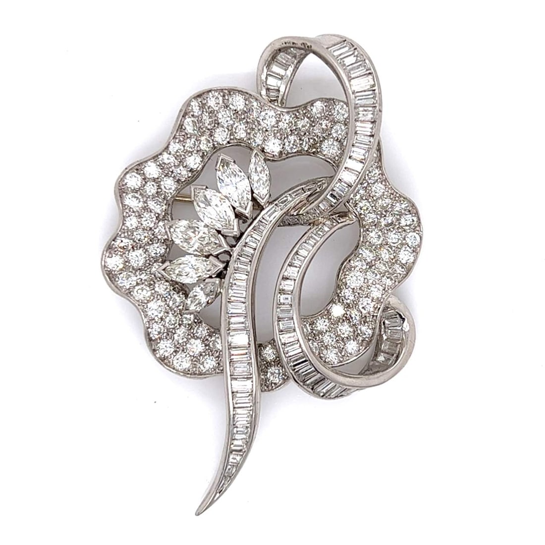 Platinum Diamond Brooch 9.10 Ct E-G VVS-VS 2.25 Inches: Platinum Diamond Brooch 9.10 Ct E-G VVS-VS 2.25 Inches This exquisite brooch features a stunning array of 184 diamonds, totaling approximately 9.10 carats. Crafted from high-quality platinum, the broo