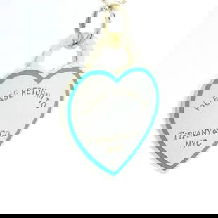 Tiffany & Co. Sterling Silver Blue Enamel Heart Pendant Necklace 24": Tiffany & Co. Sterling Silver Blue Enamel Heart Pendant Necklace 24" This exquisite pendant necklace features a charming blue enamel heart pendant crafted from sterling silver by Tiffany & Co. The nec