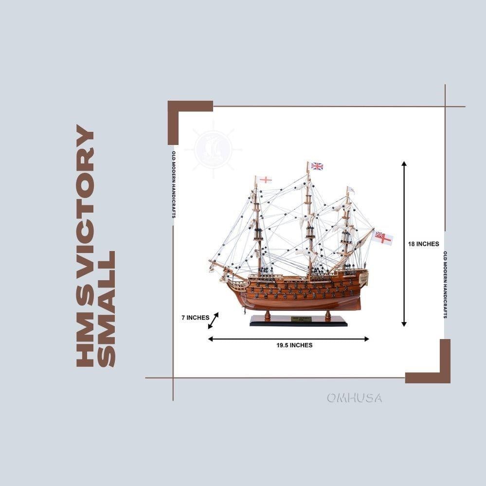 Exquisite 18" HMS Victory Model Ship in Exotic Wood: Exquisite 18" HMS Victory Model Ship in Exotic Wood This handcrafted model ship replicates the esteemed HMS Victory, showcasing intricate craftsmanship and attention to detail. Made from exotic wood,