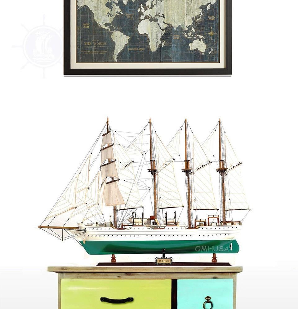 J.S. Elcano Tall Ship Model - Nautical Style: J.S. Elcano Tall Ship Model - Nautical Style This exquisite detailed model of the J.S. ElCANO is a stunning representation of a tall ship, perfect for nautical enthusiasts and collectors alike. Crafte