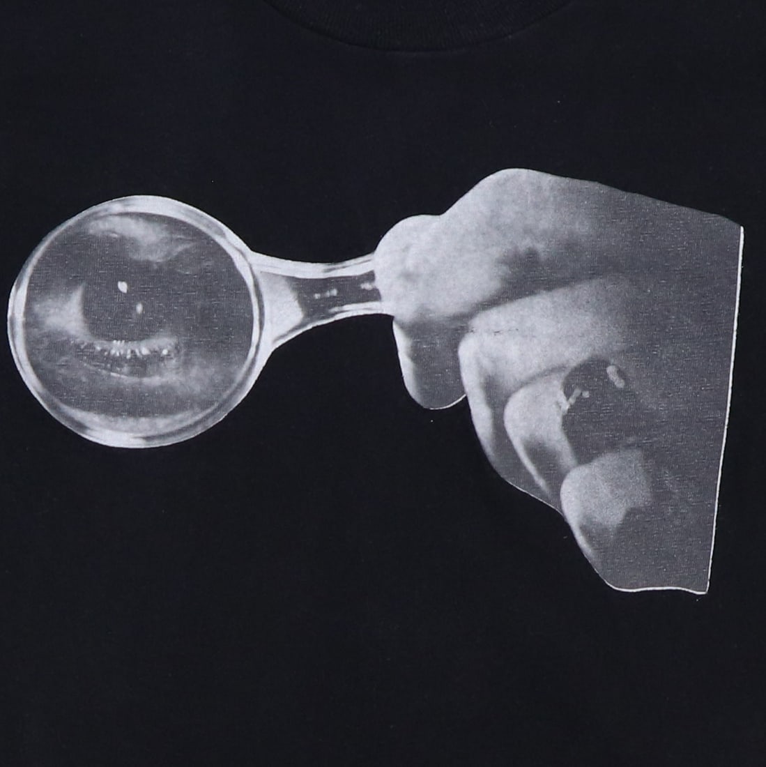 Vintage 1976 Ringo Starr Rotogravure Graphic Shirt Black Cotton: Vintage 1976 Ringo Starr Rotogravure Graphic Shirt Black Cotton This original vintage 1976 Ringo Starr Rotogravure Shirt is a must-have for any fan. Made from 100% cotton, this shirt features striking