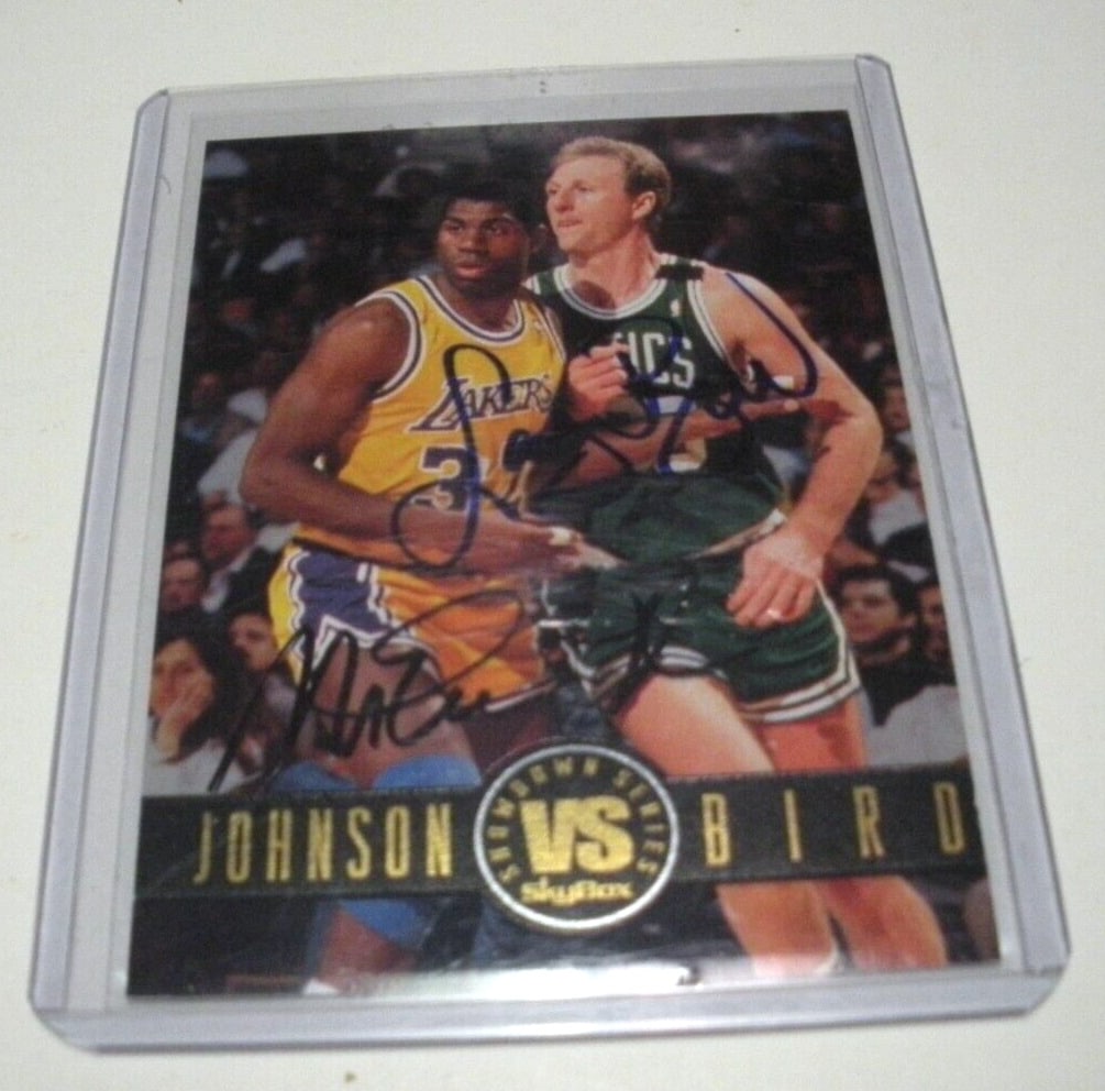 Larry Bird Magic Johnson Signed Basketball Card with COA: Larry Bird Magic Johnson Signed Basketball Card with COA This collectible card features the iconic basketball legends Larry Bird and Magic Johnson, representing the rich history of the Boston Celtics.