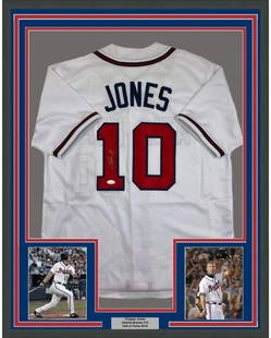 Framed Autographed Chipper Jones Atlanta Braves Jersey JSA COA 33x42: Framed Autographed Chipper Jones Atlanta Braves Jersey JSA COA 33x42 This is a framed, autographed jersey of baseball legend Chipper Jones, measuring 33x42 inches. The jersey is from the Atlanta