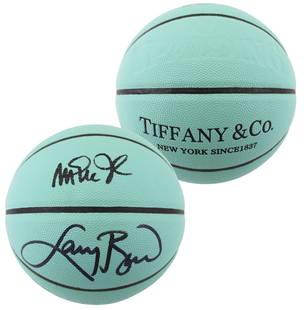 Magic Johnson Larry Bird Signed Limited Edition Basketball Beckett Authenticated: Magic Johnson Larry Bird Signed Limited Edition Basketball Beckett Authenticated This Limited Edition Tiffany & Co X Spalding Basketball features the authentic signatures of Magic Johnson and Larry