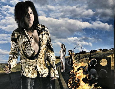 Steve Stevens Signed 11x14 Photo Billy Idol Guitarist: Steve Stevens Signed 11x14 Photo Billy Idol Guitarist This is an original 11x14 color photograph signed by Steve Stevens, the renowned guitarist from Billy Idol's band. The signature is rendered in bl