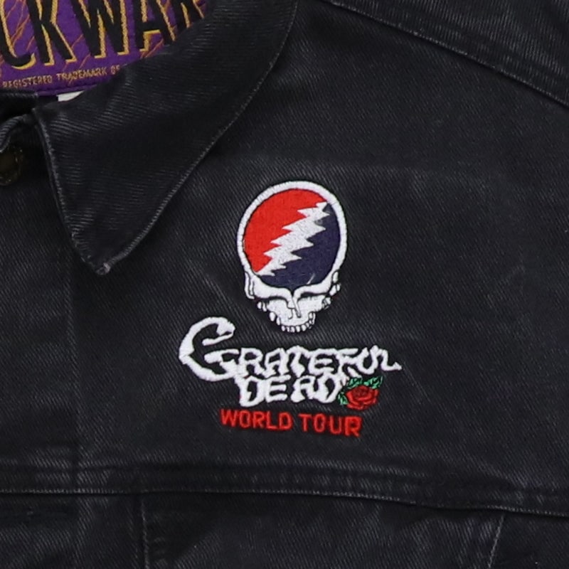 1990 Grateful Dead Vintage Tour Denim Jacket Black Graphics: 1990 Grateful Dead Vintage Tour Denim Jacket Black Graphics This original vintage 1990 Grateful Dead Twenty Five Years Tour Denim Jacket is a collector's item, perfect for fans of the iconic band. It 