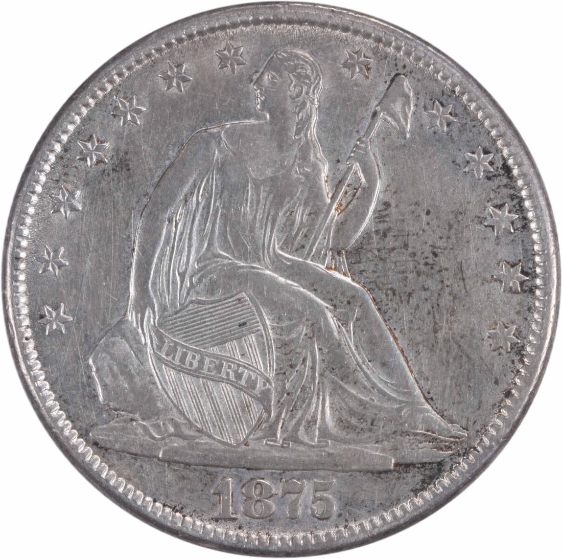 1875-CC Liberty Seated Half Dollar AU 50C Uncertified Silver Coin: 1875-CC Liberty Seated Half Dollar AU 50C Uncertified Silver Coin This 1875-CC Liberty Seated Half Dollar showcases a beautiful design by Thomas Sully and Christian Gobrecht. Struck in Carson City, th