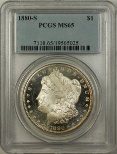 1880-S Morgan Silver Dollar PCGS MS-65 Proof Like Coin: 1880-S Morgan Silver Dollar PCGS MS-65 Proof Like Coin This 1880-S Morgan Silver Dollar is a remarkable addition for any coin collector. Graded MS-65 by PCGS, this uncirculated coin features a strikin