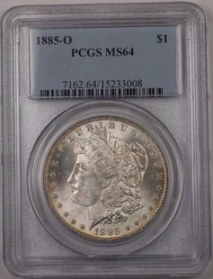 1885-O Morgan Silver Dollar PCGS MS-64 Uncirculated Rim Toned Coin: 1885-O Morgan Silver Dollar PCGS MS-64 Uncirculated Rim Toned Coin This 1885-O US Morgan Silver Dollar is a stunning example of American coinage, certified by PCGS with a grade of MS-64. Struck at the