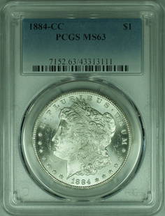 1884-CC Morgan Silver Dollar Coin PCGS MS 63 Uncirculated: 1884-CC Morgan Silver Dollar Coin PCGS MS 63 Uncirculated This 1884-CC Morgan Silver Dollar Coin, graded MS 63 by PCGS, is a stunning example of American minting history. Struck in silver at the Carso