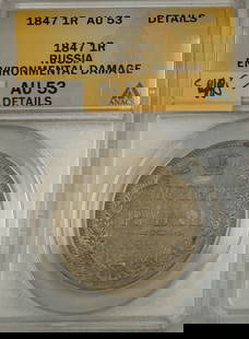 1847 Russia 1 Rouble Silver Coin ANACS AU-53 Environmental Damage: 1847 Russia 1 Rouble Silver Coin ANACS AU-53 Environmental Damage This 1847 Russia 1 Rouble silver coin is a historical piece showcasing the artistry of its time. Certified by ANACS with a grade of AU